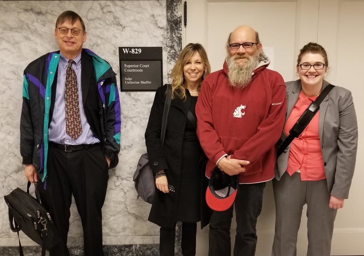 Left to Right: Jim Lobsenz of Carney Badley Spellman, Ann LoGerfo of Columbia Legal Services, Steven Long, and Alison Bilow of Columbia Legal Services.